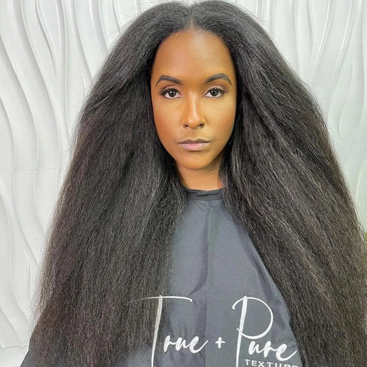 Woman wearing True + Pure Texture Relaxed Natural Blowout Kinky Straight Tape-In Hair Extensions For All Texture Types