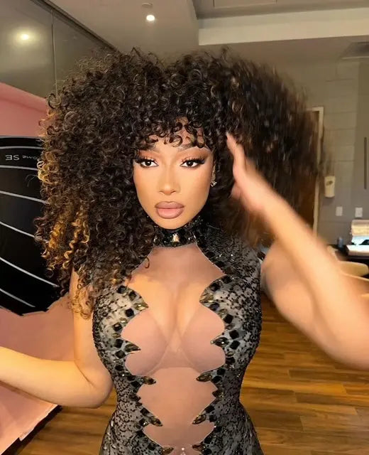 MEGAN-THEE-STALLION-IS-ON-TOUR-SETTING-THE-STAGE-ON-FIRE-WITH-HER-CURLS True and Pure Texture