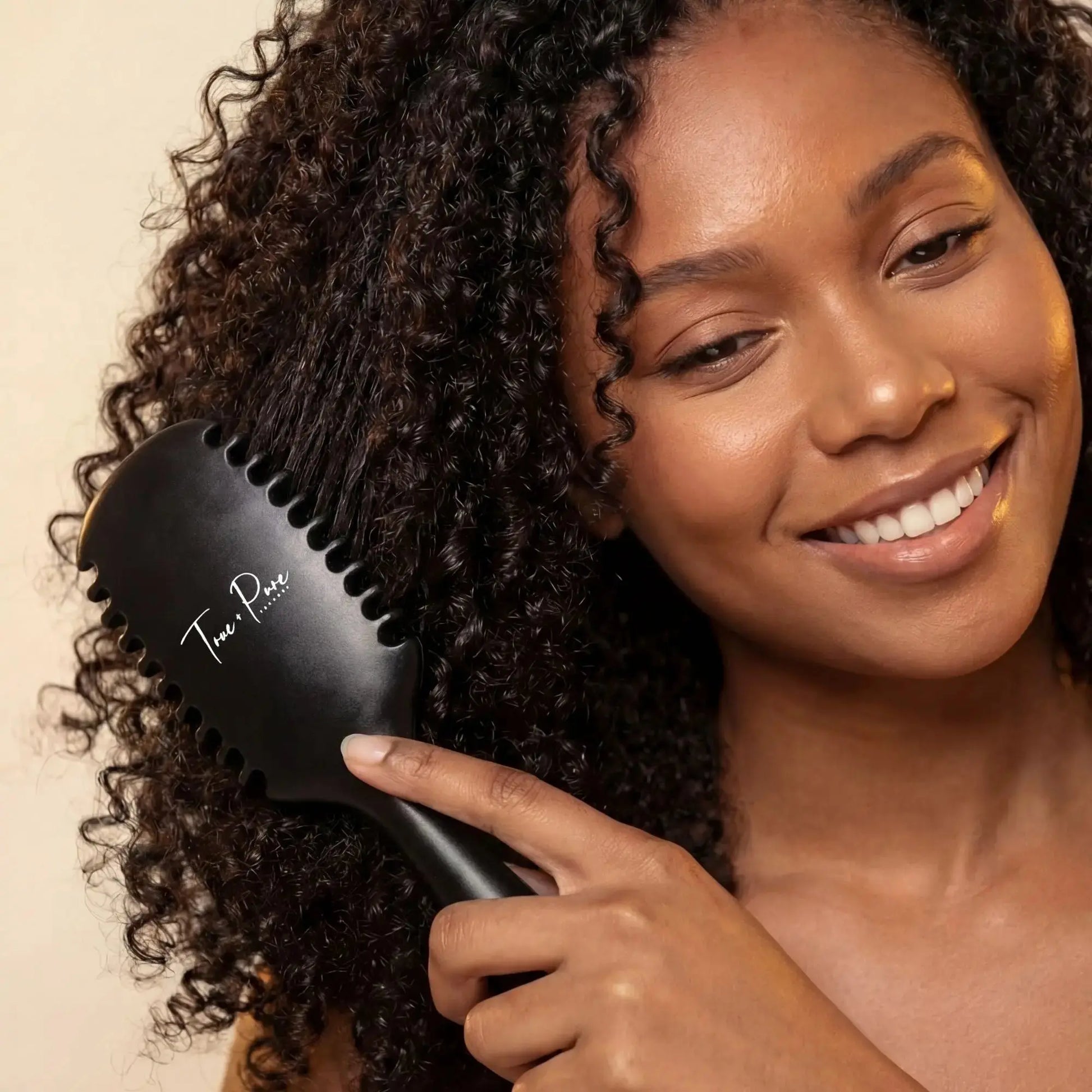 True Detangle Pro Brush with flexible bristles for natural, textured, and curly hair – reduces breakage and detangles effortlessly