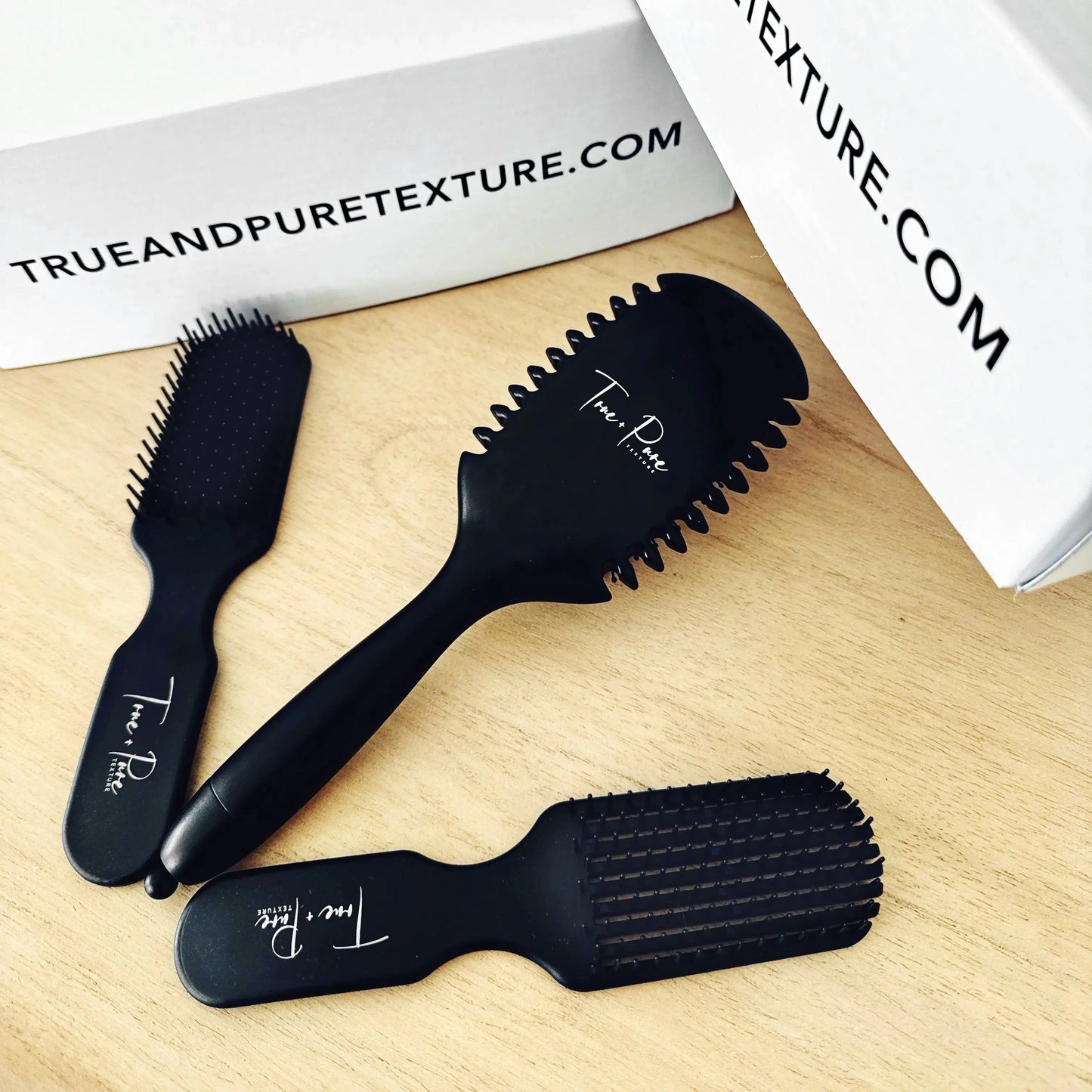 True Detangle Pro Brush with flexible bristles for natural, textured, and curly hair – reduces breakage and detangles effortlessly