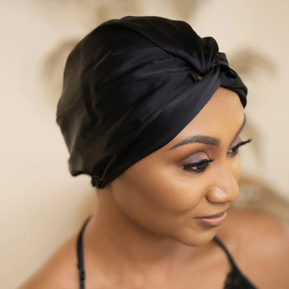 Satin hair turban designed for natural hair care, anti-frizz protection, and overnight moisture retention—ideal hair wrap for sleeping, preventing breakage, and preserving curly hairstyles.