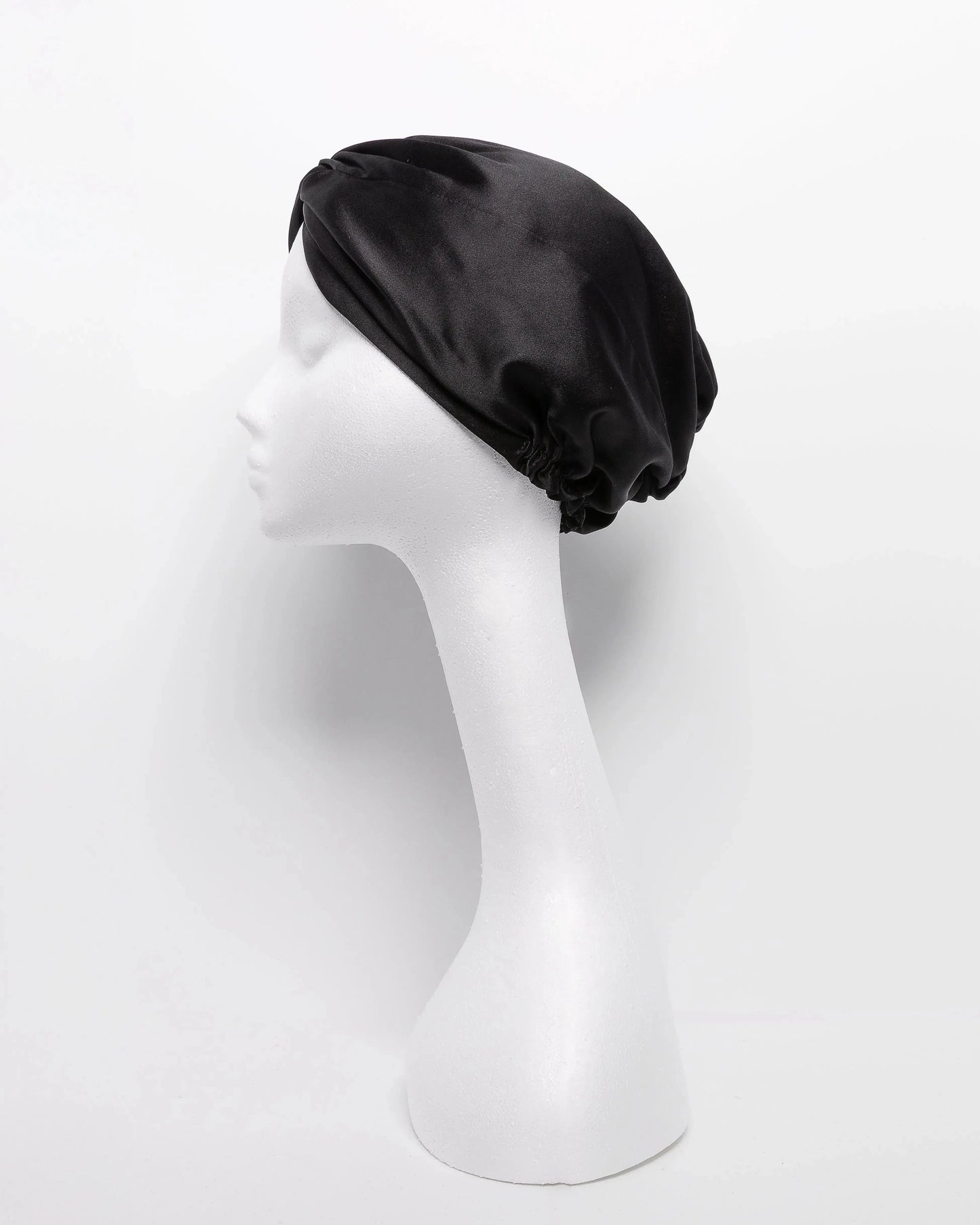 Satin hair turban designed for natural hair care, anti-frizz protection, and overnight moisture retention—ideal hair wrap for sleeping, preventing breakage, and preserving curly hairstyles.