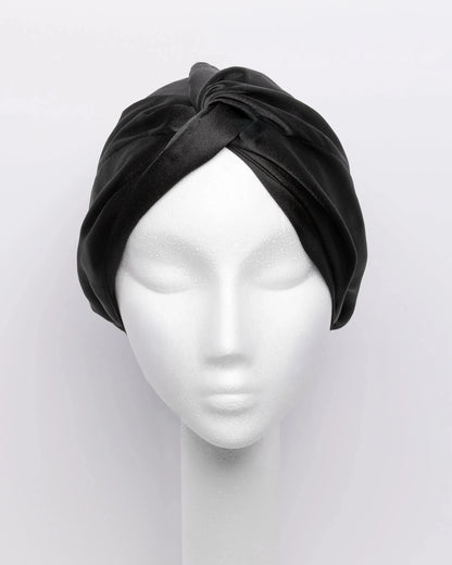 Satin hair turban designed for natural hair care, anti-frizz protection, and overnight moisture retention—ideal hair wrap for sleeping, preventing breakage, and preserving curly hairstyles.