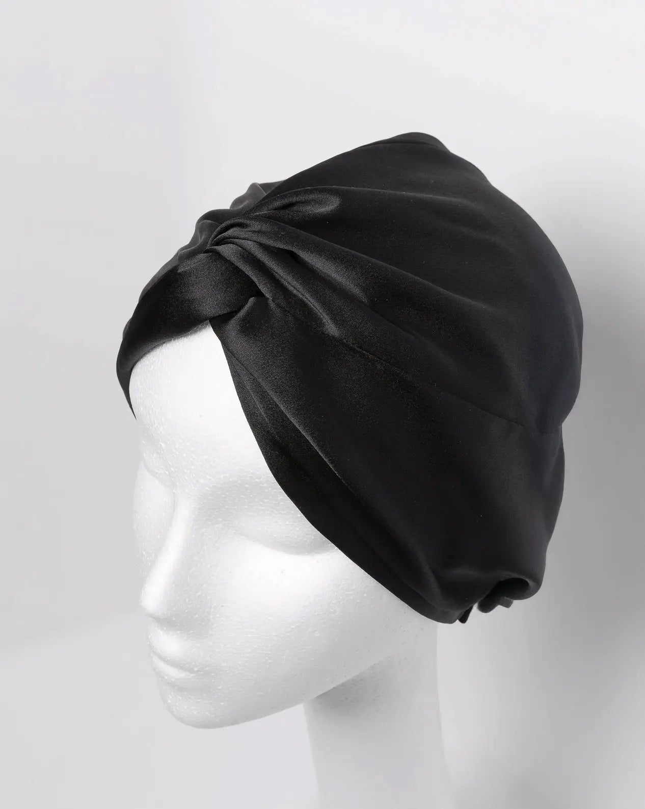Satin turban for natural hair wrapped on curly hair